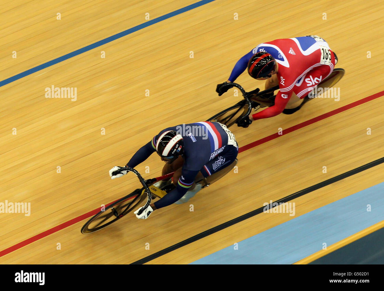 Great Britain's Sir Chris Hoy (right) with France's Gregory Bauge in the Men's Sprint Quarterfinals race 1 during day three the UCI Track Cycling World Cup at the Velodrome in the Olympic Park, London. Stock Photo