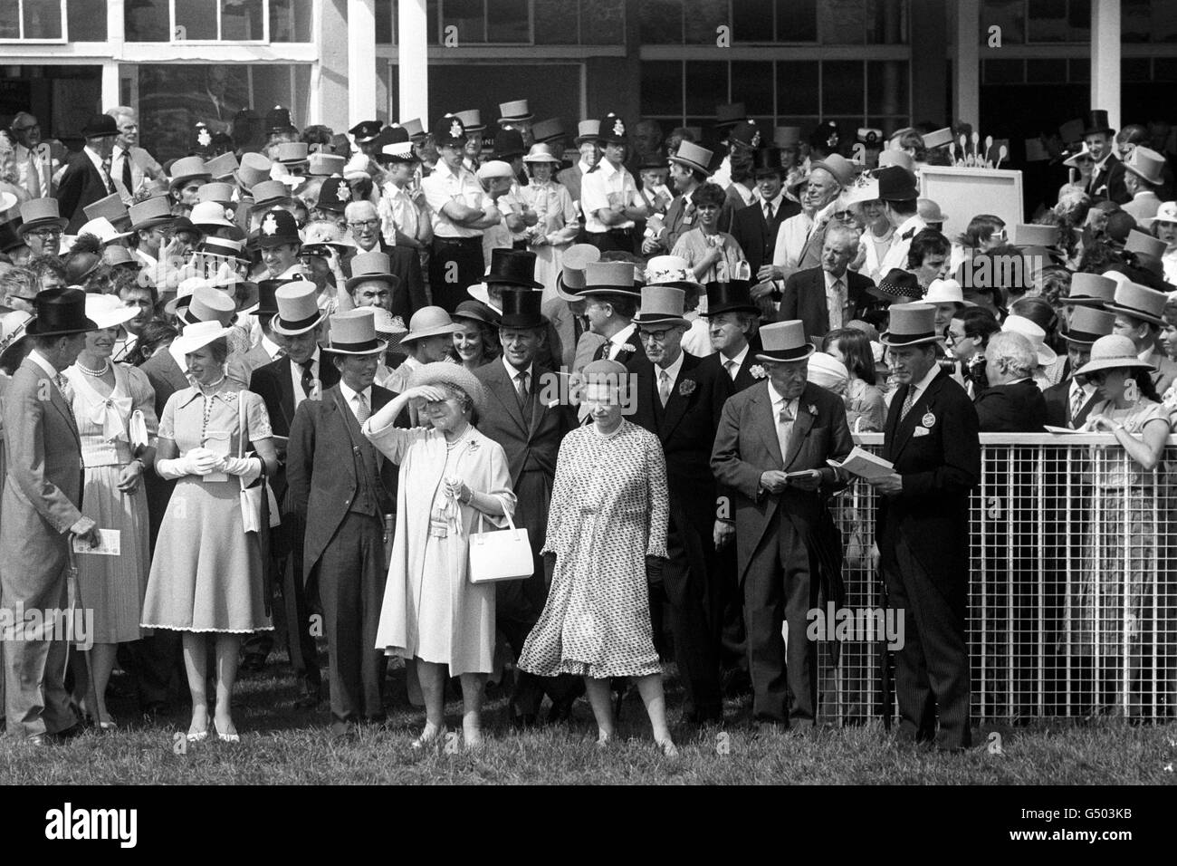 The Queen and the Queen Mother on the course ahead of the Derby Stakes. Also pictured from the royal family are Princess Anne, Hon Angus Ogilvy, Princess Michael of Kent and the Duke of Edinburgh. Stock Photo