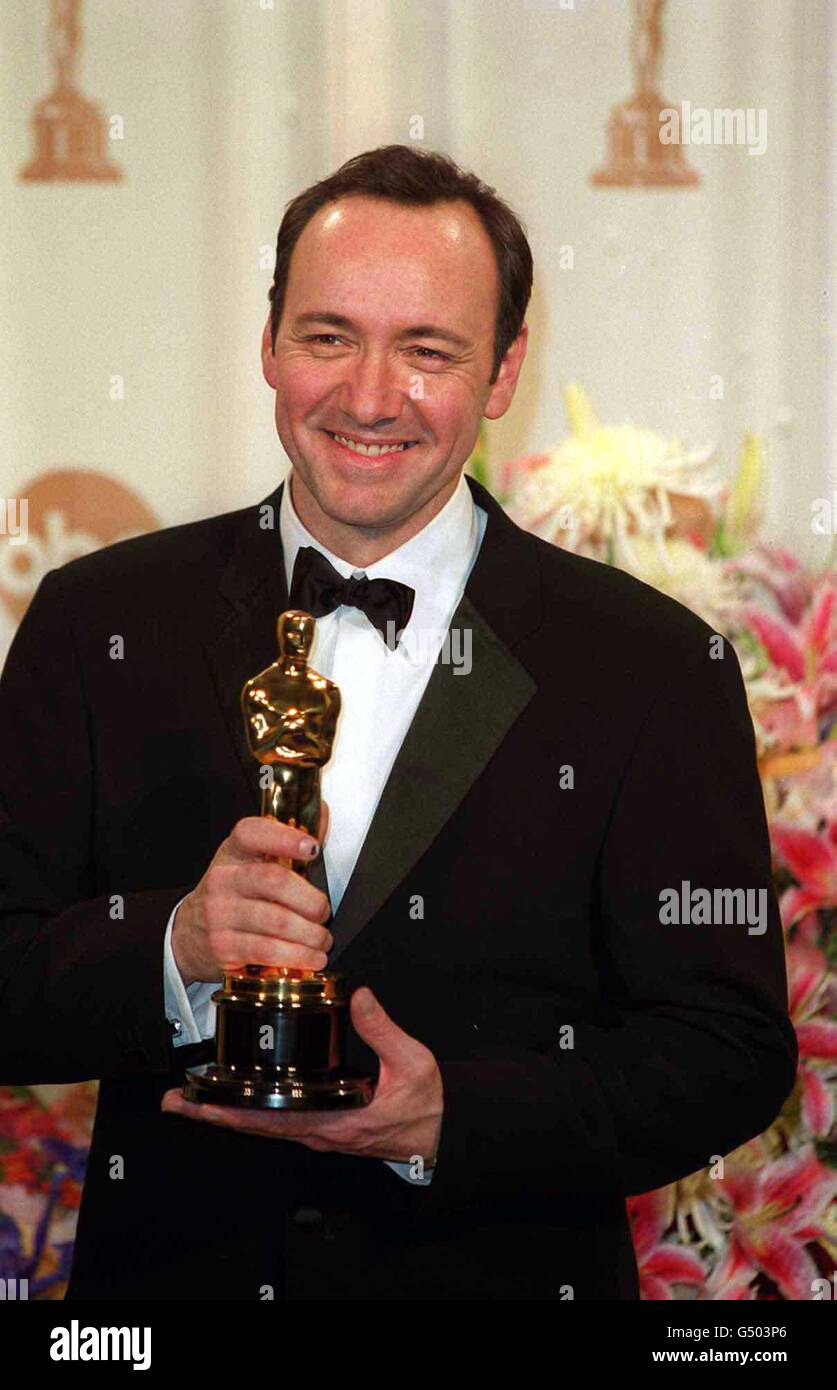American Actor Kevin Spacey With His Oscar For Best Actor Which He Won American Actor Kevin Spacey With His Oscar For Best Actor Which He Won