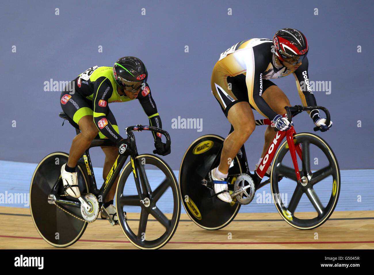 Cycling - UCI Track Cycling World Cup and Olympic Games Test Event - Day Two - Olympic Velodrome. Malaysia's Awang Azizulhasni (left) and Japan's Nitta Yudai compete during the Men's Keirin First Round Stock Photo