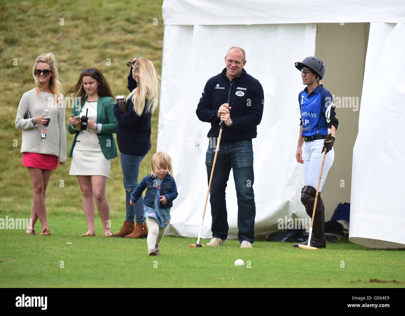 Mike Tindall with his daughter Mia Grace (centre) at a charity polo Stock  Photo - Alamy