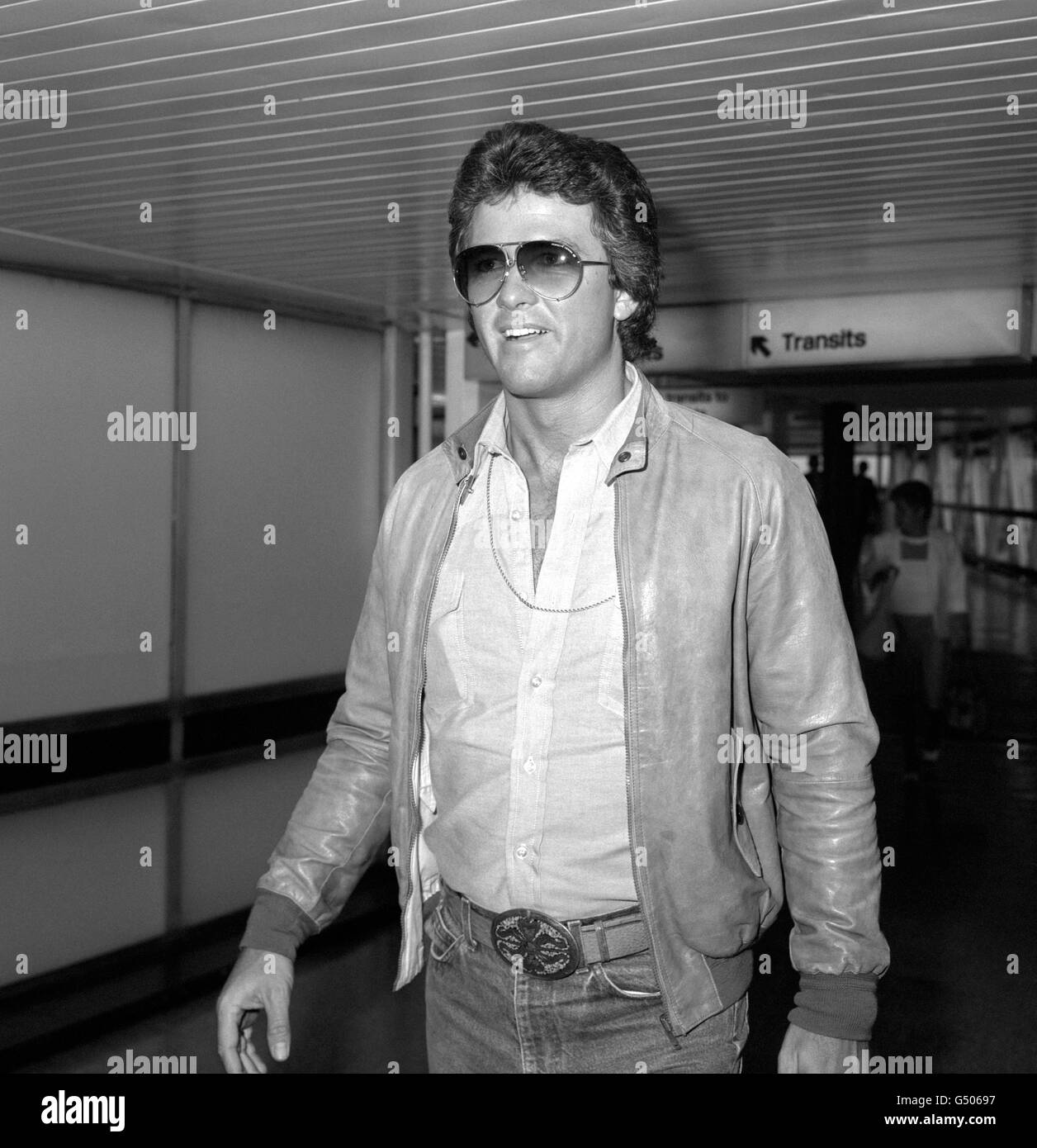 American actor Patrick Duffy, who plays Bobby Ewing in the television series 'Dallas', arriving at Heathrow Airport, London, from Los Angeles to make a promotional video. Stock Photo