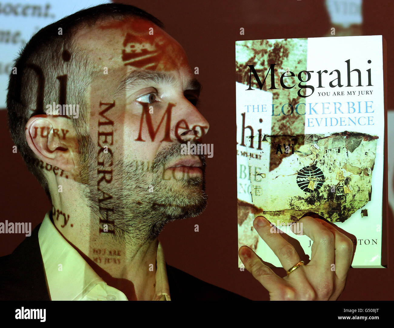 John Ashton, author, holds his book 'Megrahi: You Are My Jury' during the book launch in Edinburgh. Stock Photo
