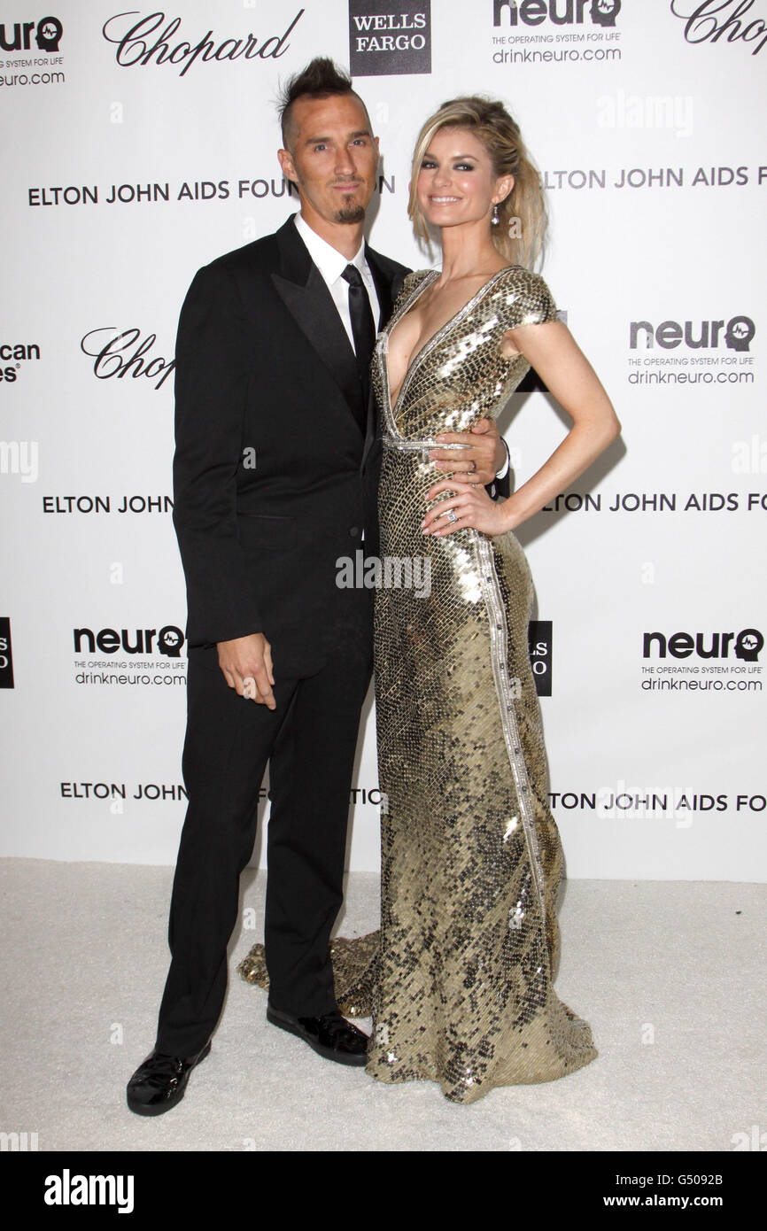 Marissa Miller and Griffin Guess arriving for the Elton John Aids Foundation Academy Awards Viewing Party at West Hollywood Park in Los Angeles, USA. Stock Photo