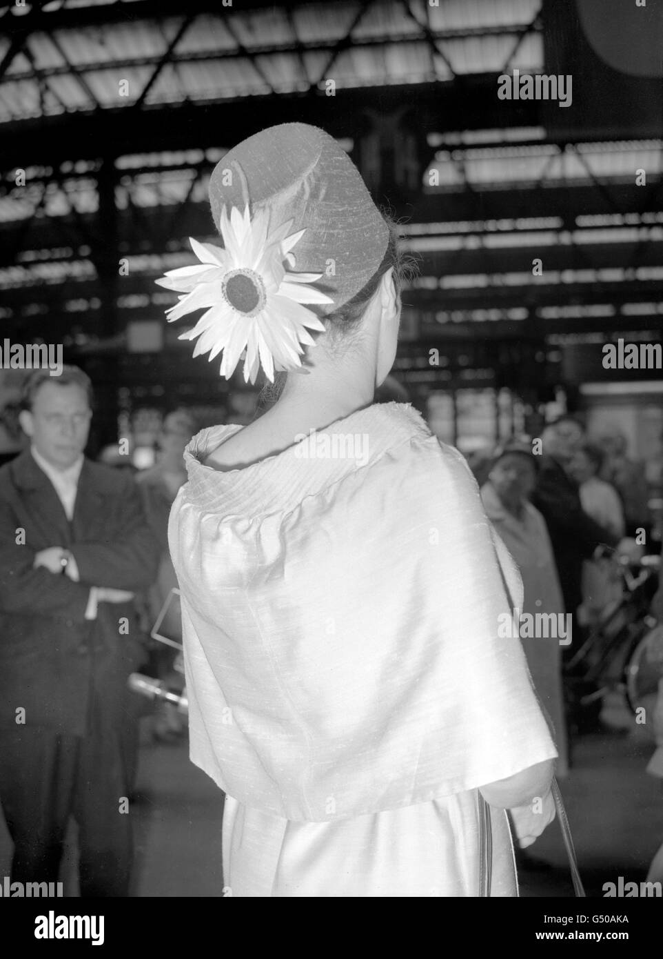 Horse Racing - Royal Ascot - Race Goers at Waterloo Station, London. Mrs. Helen Shaw arrives at London's Waterloo Station before heading off to Royal Ascot Stock Photo