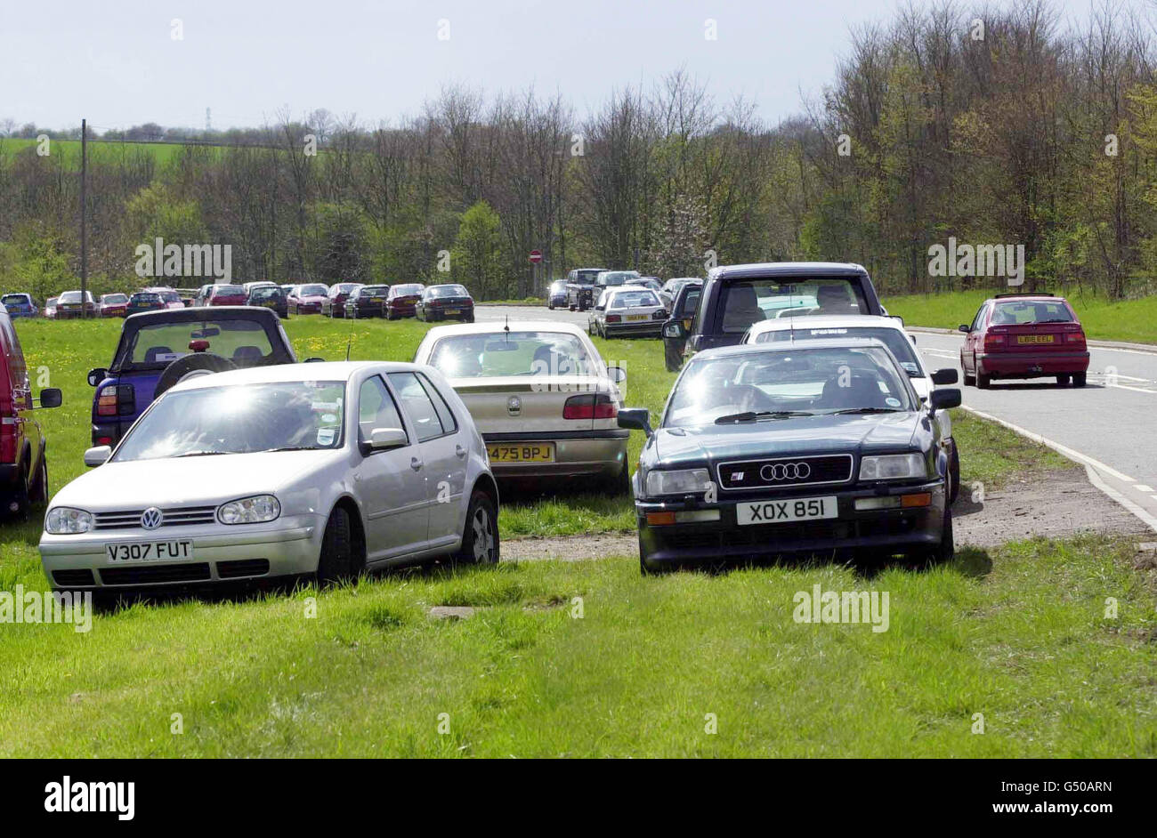 Parked cars on the A43, 7 miles from Silverstone, as traffic jams stretching more than 10 to 15 miles built up on routes into the Northamptonshire race track on the day of the British Grand Prix, forcing drivers to walk to the race. * ...when they realised they were unable to get to the track on time. Stock Photo