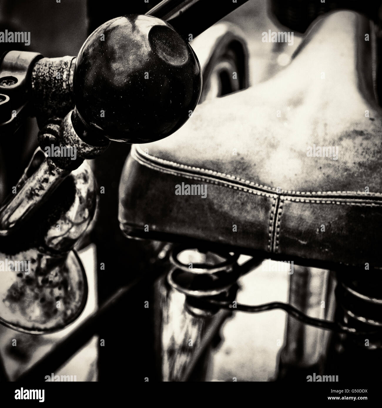 Vintage close up of a horn and bicycle saddle with a mixed background Stock Photo