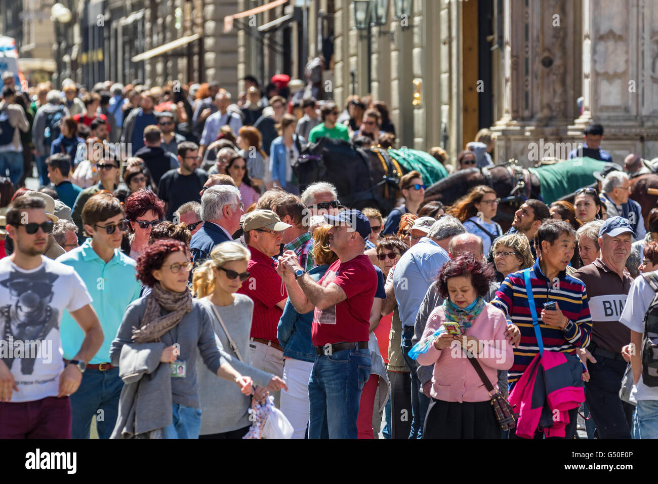 Lots of people walking on a city street Stock Photo - Alamy