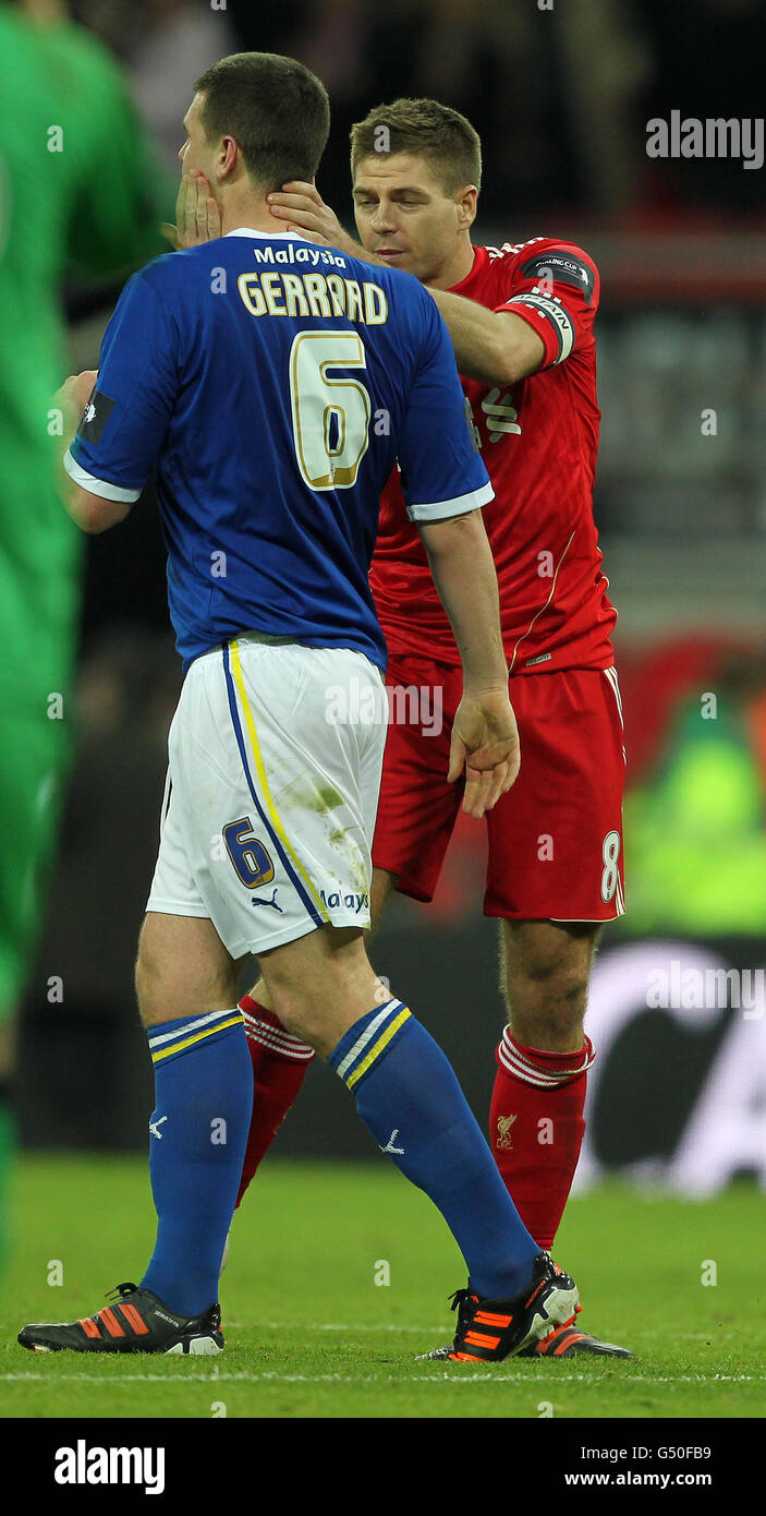 Liverpool s Steven Gerrard right console s his cousin Anthony
