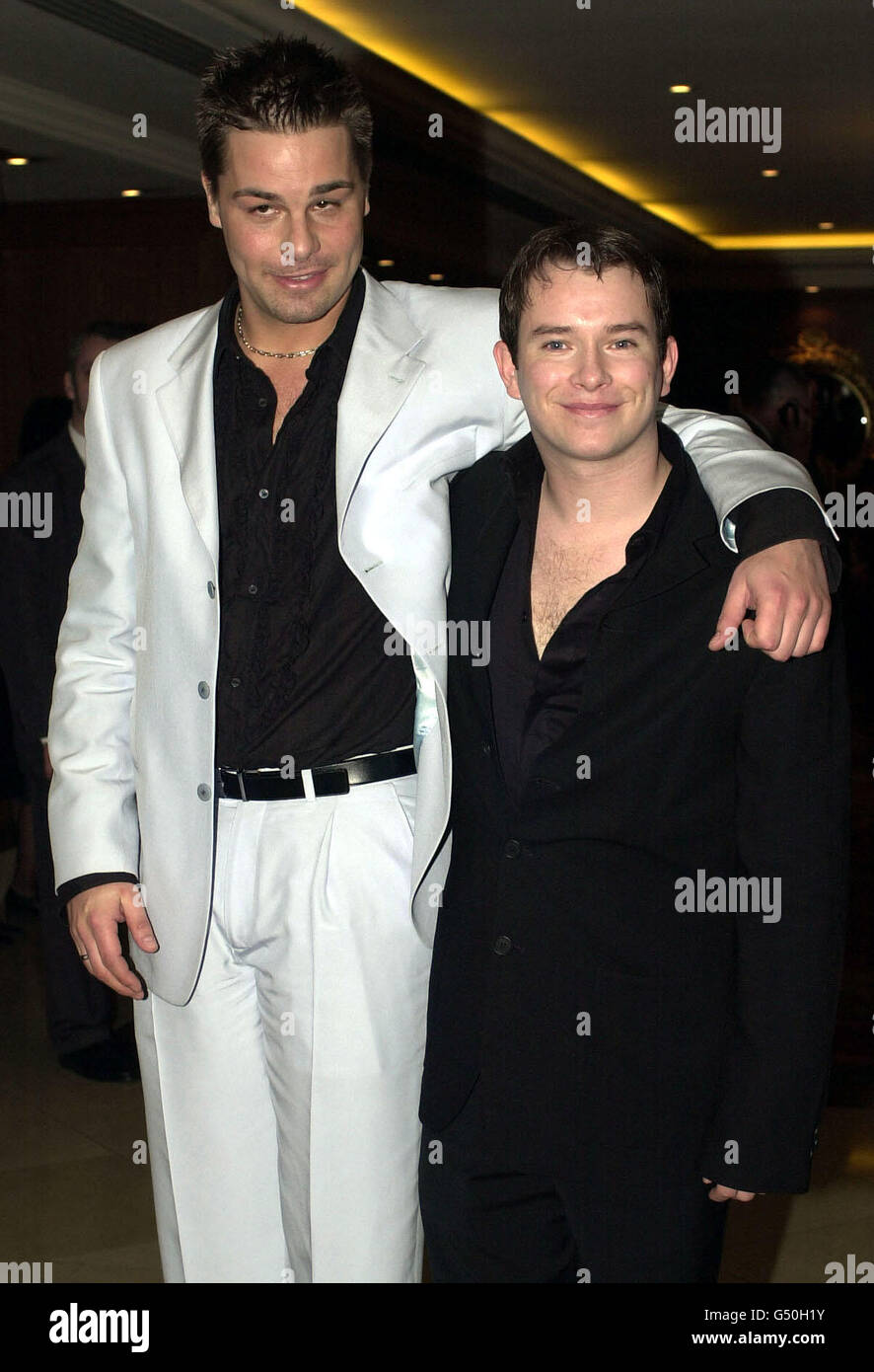 Singer Stephen Gately from Boyzone and boyfriend, Eloy de Jong arrive at the Royal Lancaster Hotel in central London for the Capital FM London Awards. Stock Photo