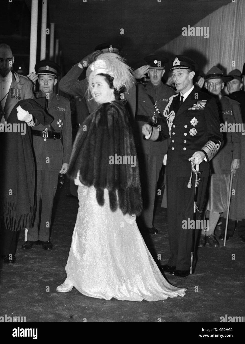 Queen Elizabeth (later the Queen Mother) and King George VI leaving Westminster Abbey following the marriage of their daughter Princess Elizabeth to the newly created Duke of Edinburgh. Stock Photo