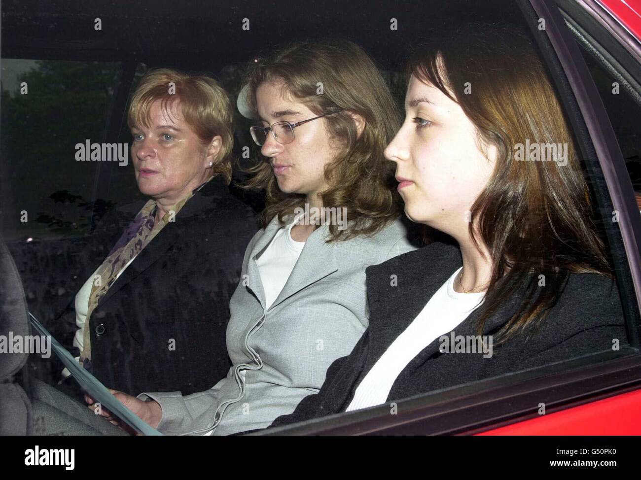 Karen Burke, centre, leaves Harlow Magistrates Court in Essex after she appeared in court in relation to an alleged assault on feminist writer and 61 year old academic Germaine Greer. * Burke 19, of Wollaton near Nottingham is accused of assault occasioning actual bodily harm and assaulting and detaining Ms Greer against her will. Miss Burke, a first year student at Bath University, was remanded on conditional bail until June 6. Stock Photo