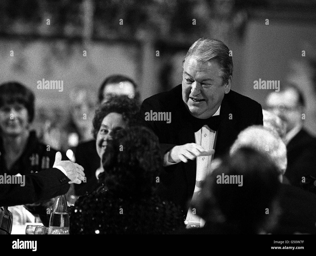 Novelist Kingsley Amis surrounded by well-wishers at the Booker Prize presentation dinner at the Guildhall, London, where he was announced the winner of the 15,000 literary prize for his book The Old Devils. Stock Photo