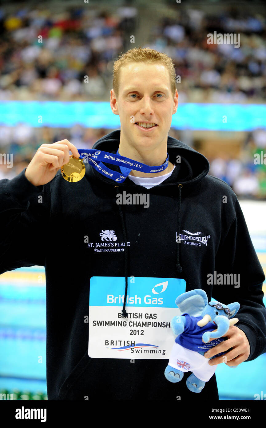 Swimming - British Gas Swimming Championships 2012 - Day Four - Aquatics Centre. Joseph Roebuck celebrates with his gold medal after victory in the Men's 200m Butterfly Stock Photo