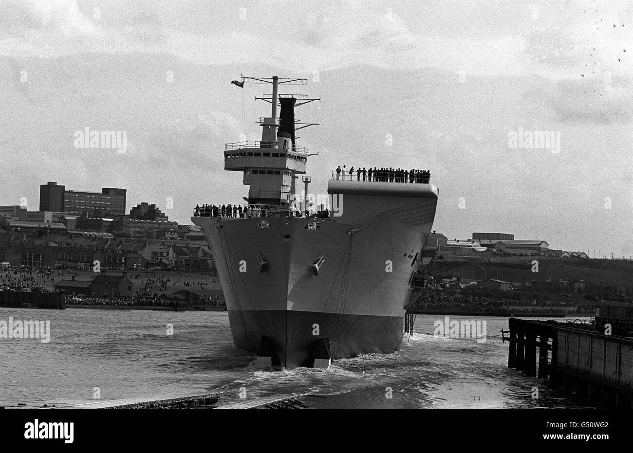 The Royal Navy's aircraft carrier Ark Royal in the Tyne after being launched by the Queen Mother Stock Photo