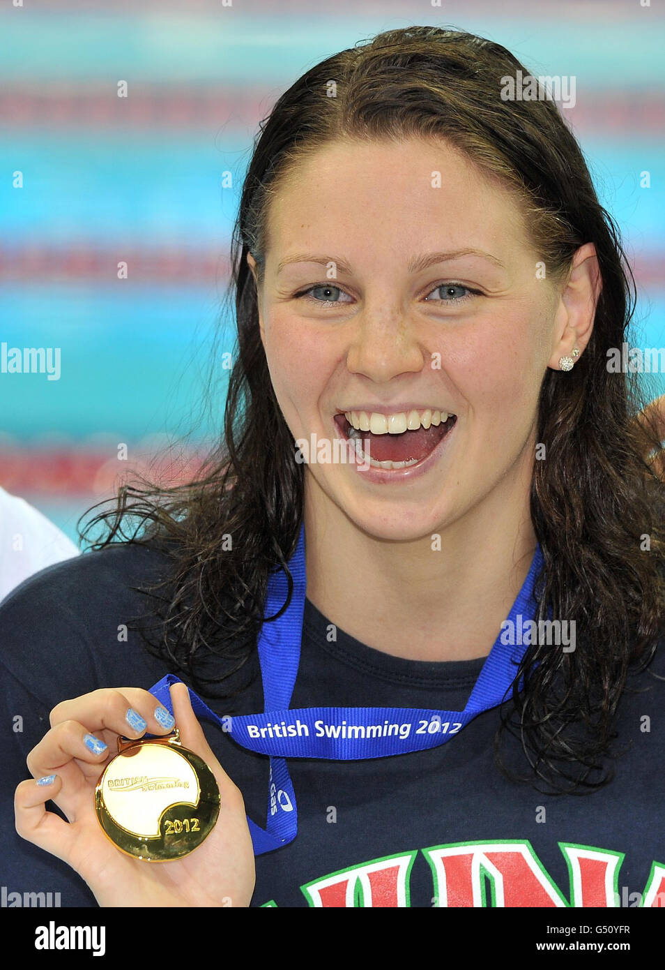 Ellen Gandy with the Gold medal after winning of the women's 100m Butterfly during the British Gas Swimming Championships at the Aquatics Centre in the Olympic Park, London. Stock Photo