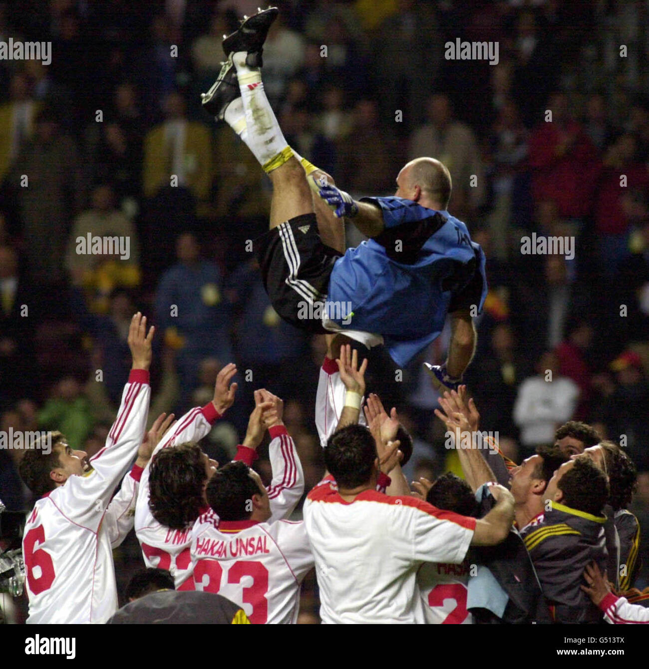 Galatasary goalkeeper Claudio Taffarel is thrown in the air after his team won the UEFA Cup against Arsenal after the penalty shoot-out at the Parken Stadium, Copenhagen. Final Score: Arsenal 0 Galatasaray 0 (0-0 aet, Galatasaray won 4-1 on penalties). Stock Photo