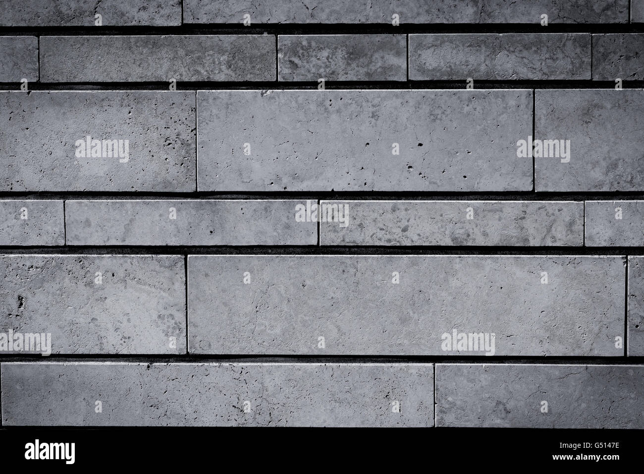 Gray stone wall closeup background of photo texture Stock Photo - Alamy