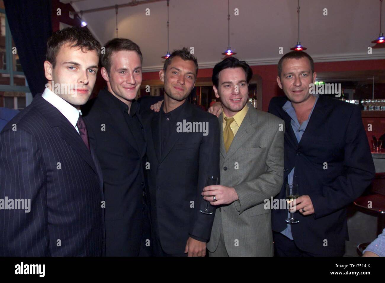 (L-R) Actors Johnny Lee Miller, Peter McDonald; Jude Law, Ewan McGregor and Sean Pertwee before the celebrity premiere of the film, 'Nora', at the Everyman Cinema in Hampstead, London. Stock Photo