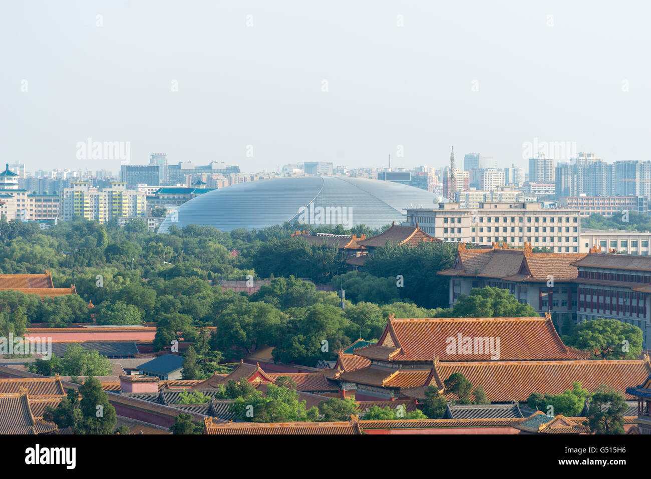 China, Beijing, looking over the rooftops of the Forbidden City at the ...