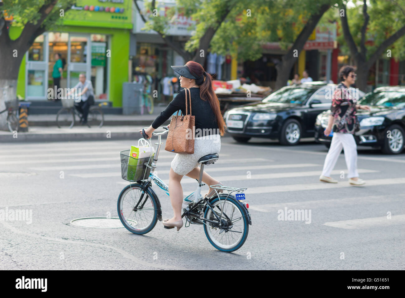 China, Beijing, cyclist on the streets of Beijing Stock Photo