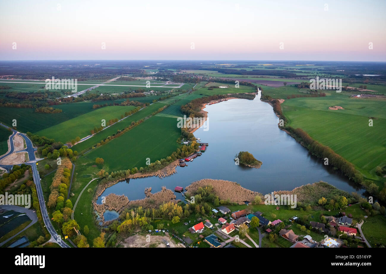Aerial view, swamp lake with Müritz Airpark in the background, Rechlin, Mecklenburg Lake District, Mecklenburg Lake District, Stock Photo