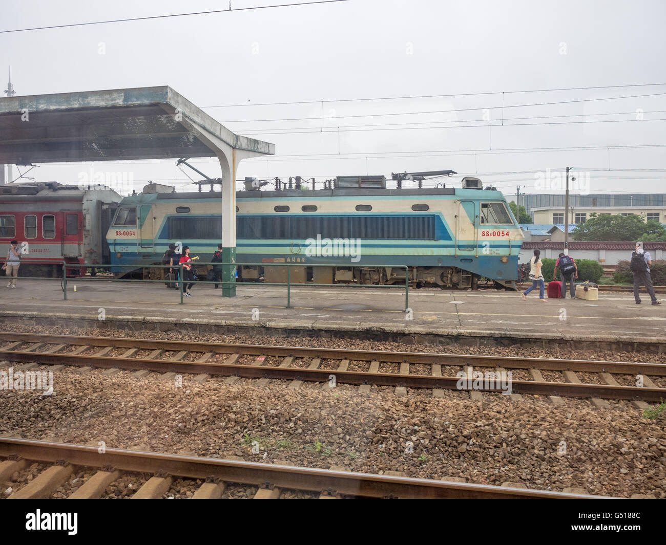 China, train at a railway station Stock Photo - Alamy