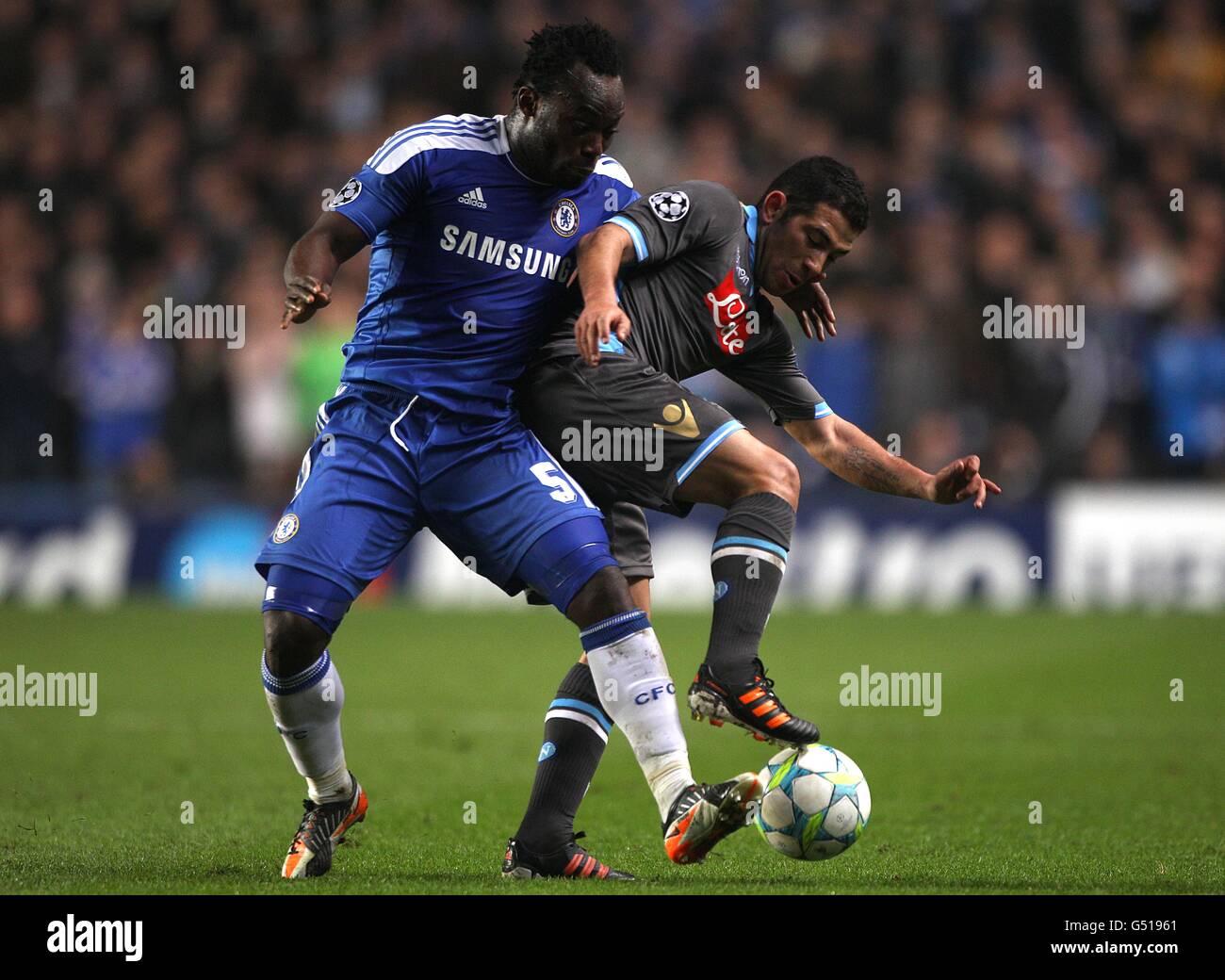 Napoli's Walter Gargano (right) and Chelsea's Michael Essien battle for the ball Stock Photo