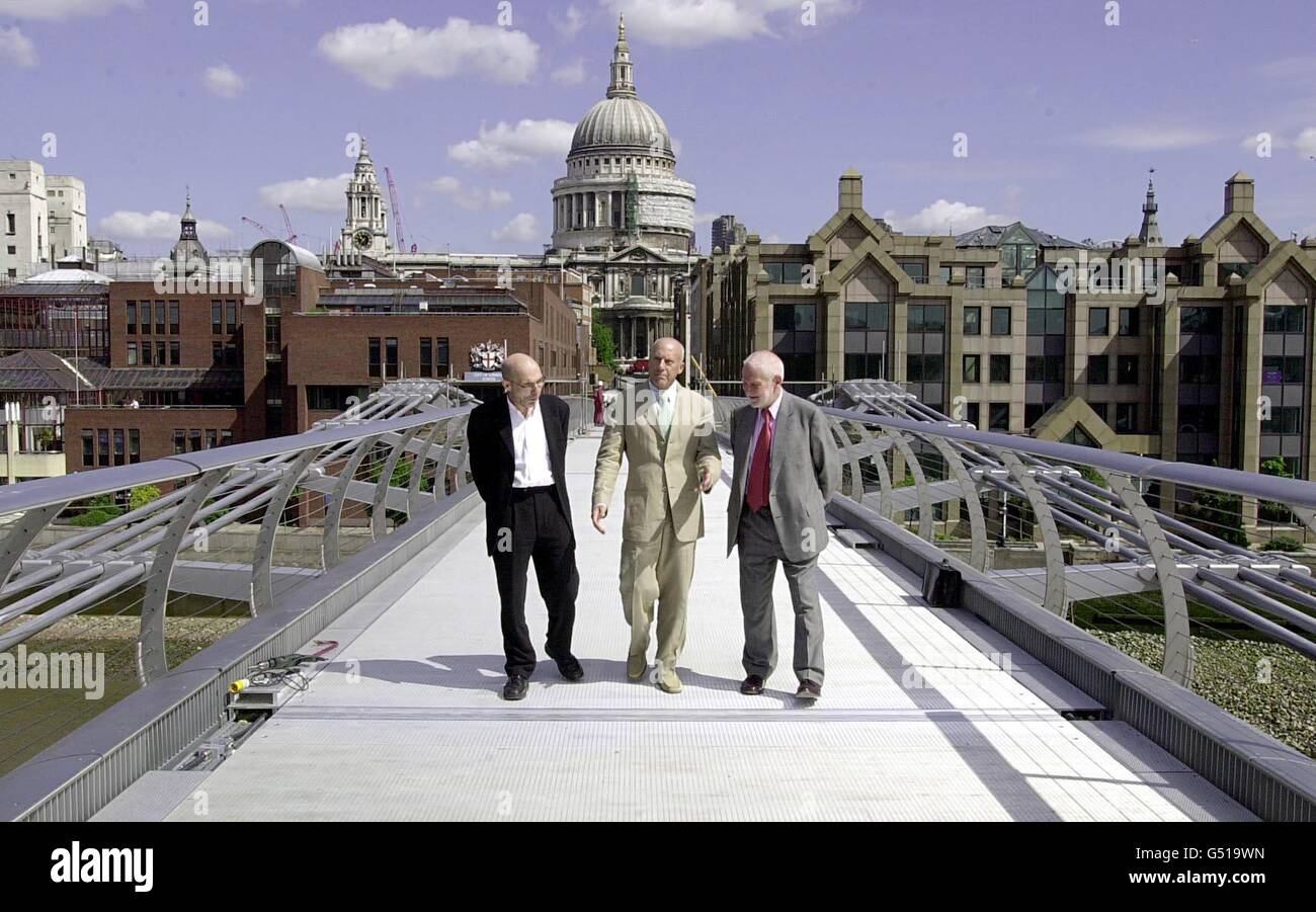 The design team of the Millennium Bridge (L-R) Tony Fitzpatrick, Arup (engineers), Lord Foster, Foster and Partners (architects) and Sir Anthony Caro (sculptor), cross the bridge, ahead of its official opening to the public on 10/6/00. * The Millennium Bridge will be the first new Thames crossing in central London since Tower Bridge opened in 1894. Stock Photo