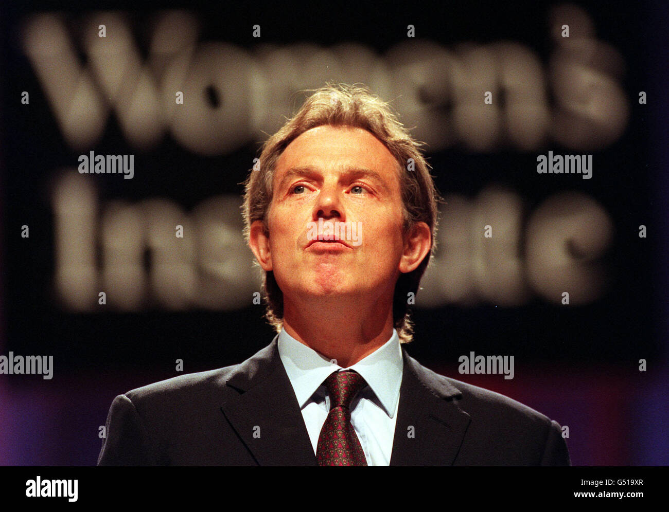 Prime Minister Tony Blair sings "Jerusalem" before he gives a speech at
