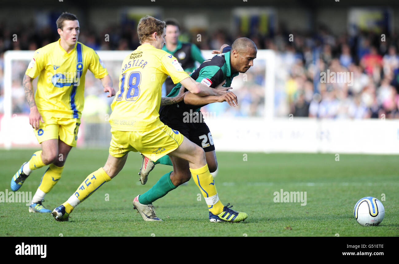 Torquay United's Loe Oastler (right) and Bristol Rovers' Chris Zebroski in action during the npower Football League Two match at Plainmoor, Torquay. Stock Photo