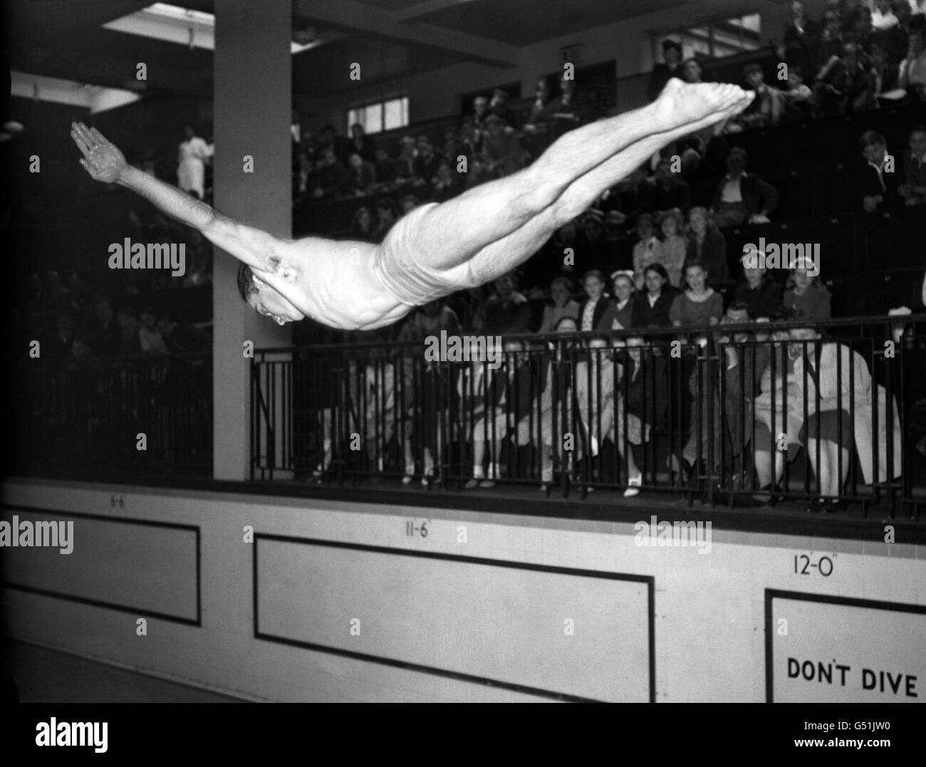 Diving - Mexico Olympic Diving Team - York Hall, London. Joaquin Capilla, Mexican high diver, performs a swallow dive. Stock Photo
