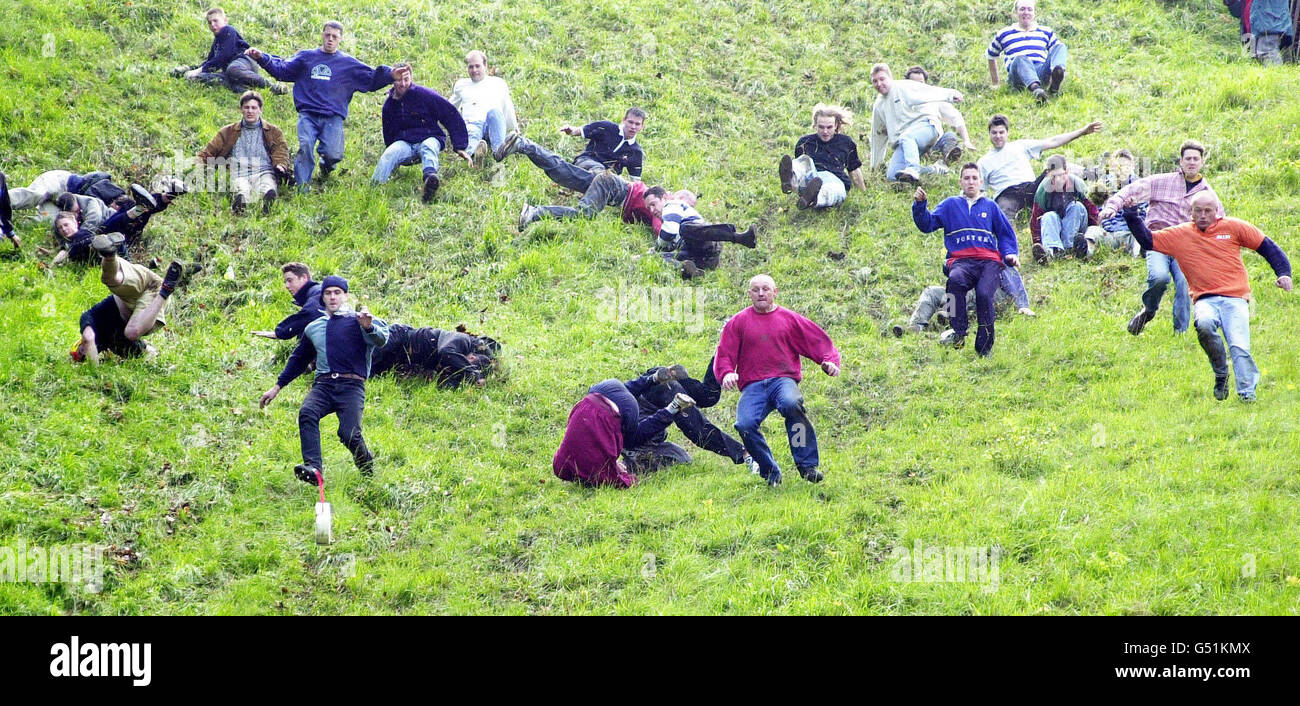 Cheese rolling contest hill chase Stock Photo Alamy