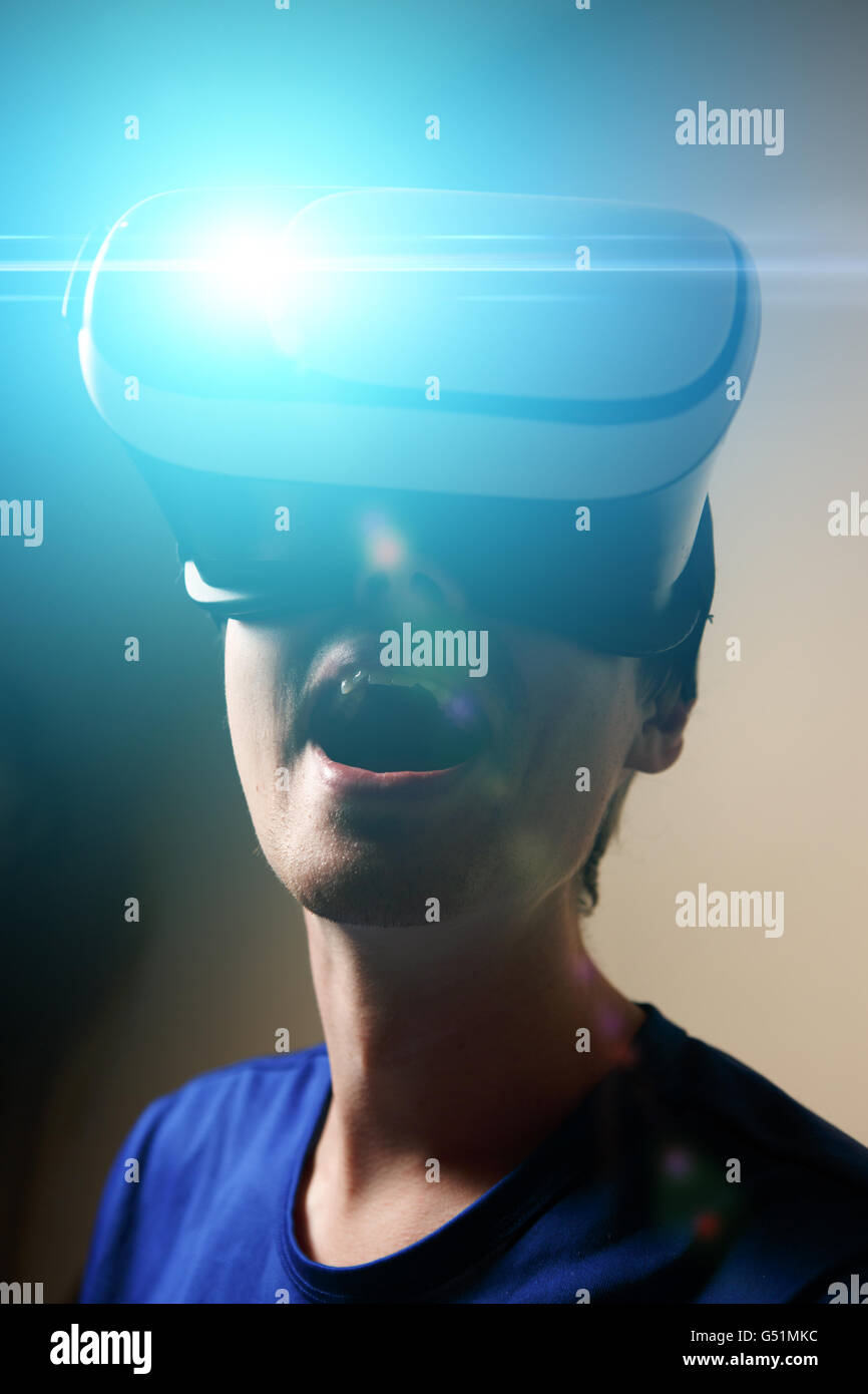 Man wearing virtual reality goggles Stock Photo - Alamy
