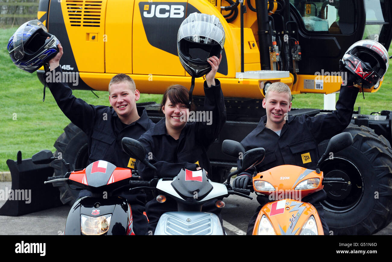 Sixteen-year-old triplets (left to right),Jack, Katie and Liam Rowe, who live in Dane Grove, Cheadle, Staffs, as they arrive for work as apprentice welders at the JCB Heavy Products plant in Uttoxeter, Staffordshire. Stock Photo