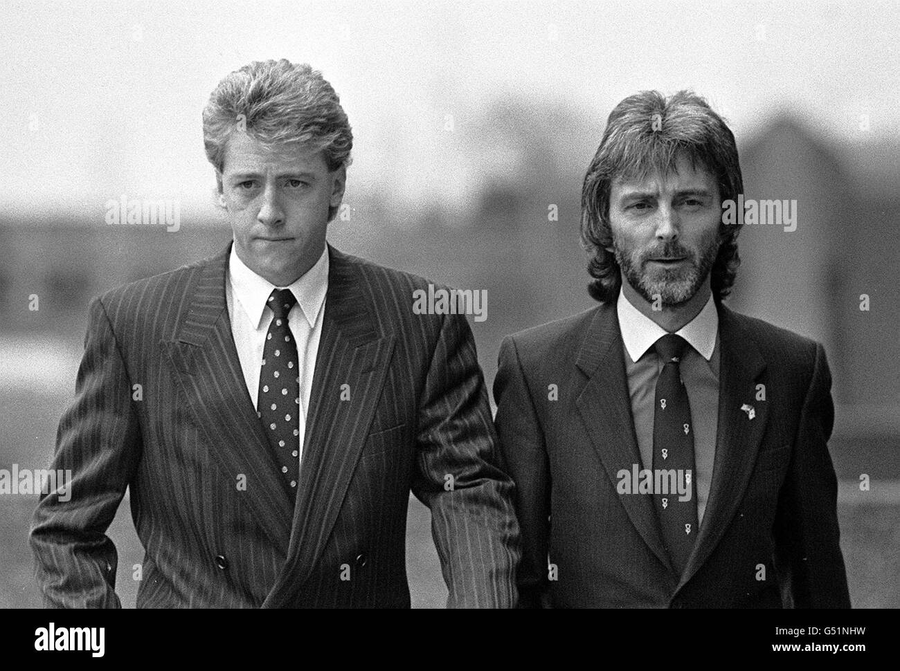 Celtic's Frank McAvennie (L) and his agent Bill McMurdo in Glasgow, at the Sheriff Court, where he and three Rangers' players denied charges arising from the ir 'Old Firm' derby at Ibrox Stadium in October 1987. Stock Photo