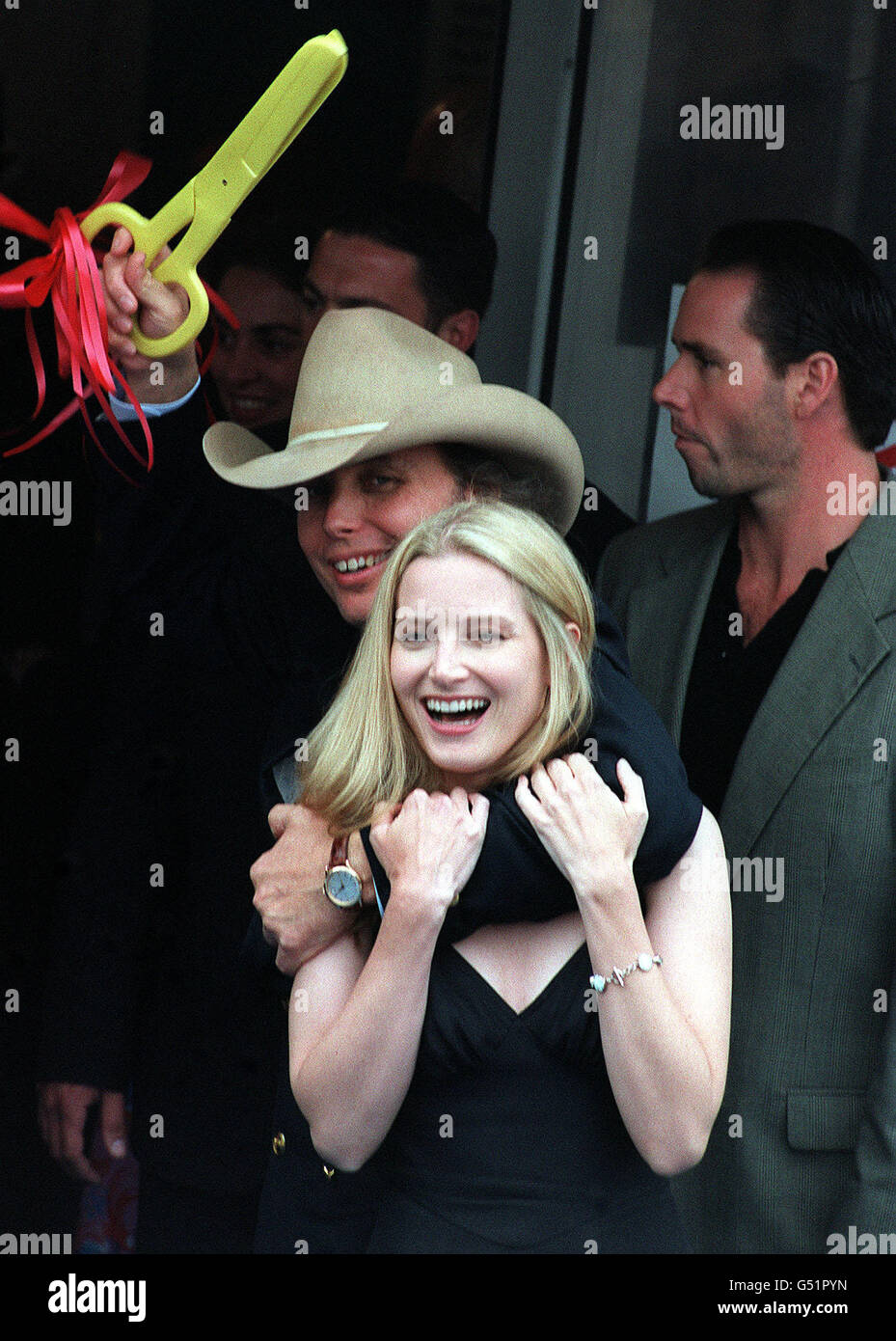 Bridget Fonda Cannes 2000. American actress Bridget Fonda and country singer Dwight Yoakam at the Cannes film festival 2000, in France. Stock Photo