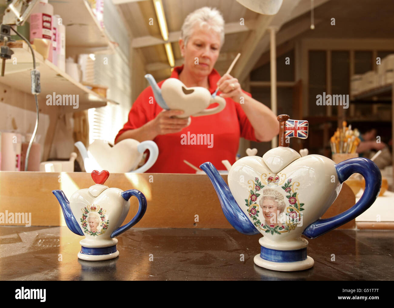 Carol Bridges paints a heart shaped tea pot celebrating the Queen's