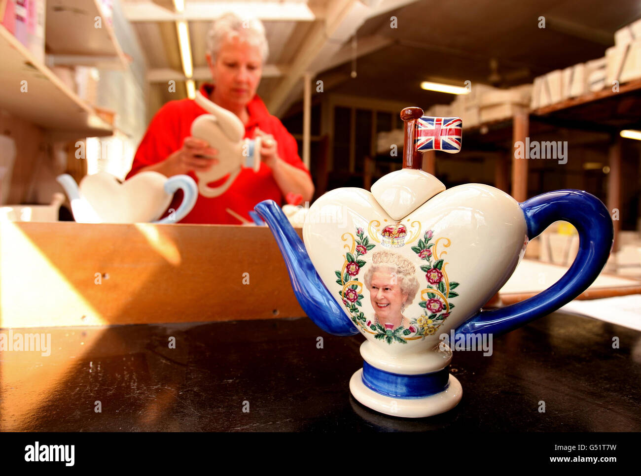 Carol Bridges paints a heart shaped tea pot celebrating the Queen's