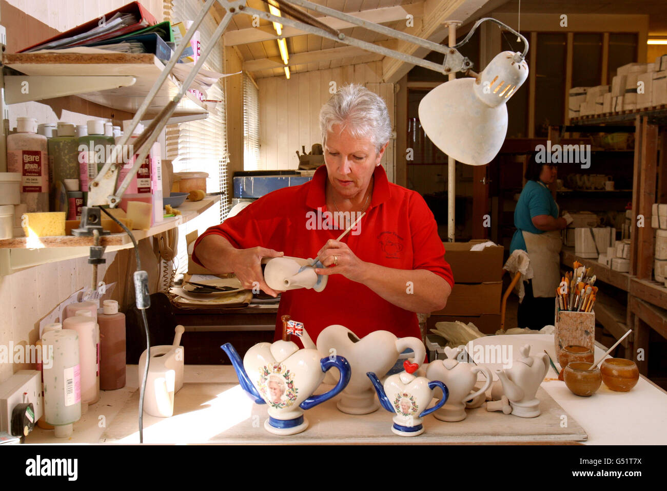 Carol Bridges paints a heart shaped tea pot celebrating the Queen's