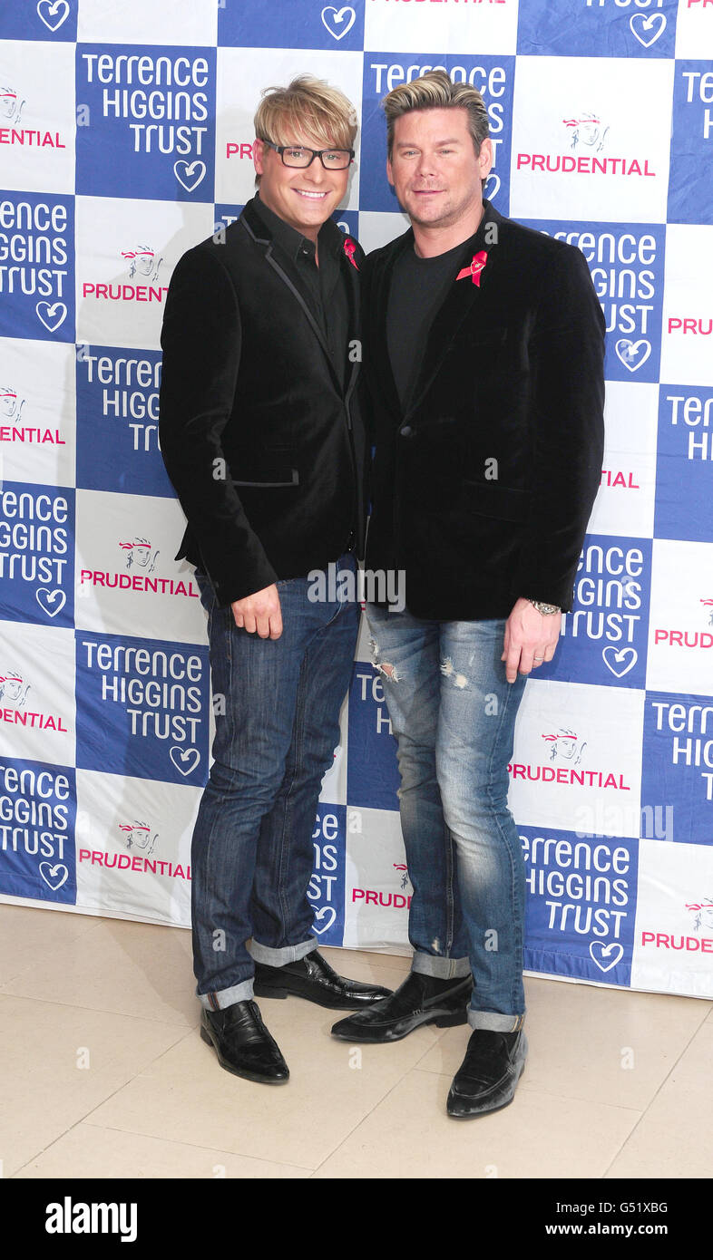 (left to right) Gary Cockerill and Phil Turner arrive at the Lighthouse Gala Auction, in aid of the Terence Higgins Trust, at Christies in London. Stock Photo