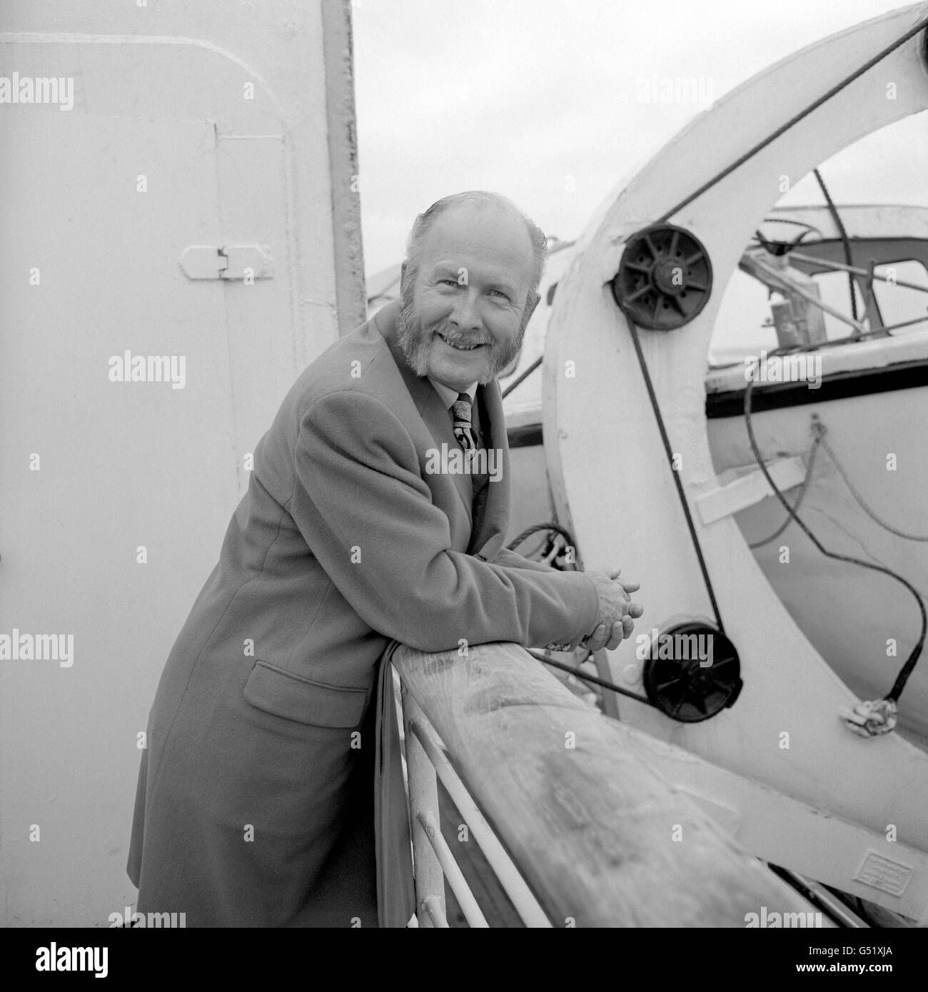 British businessman Alan Pegler, who is the owner of the famous steam locomtive The Flying Scotsman and President of the Festiniog Railway in North Wales, seen aboard ship at Southampton, having returned from San Francisco. Stock Photo