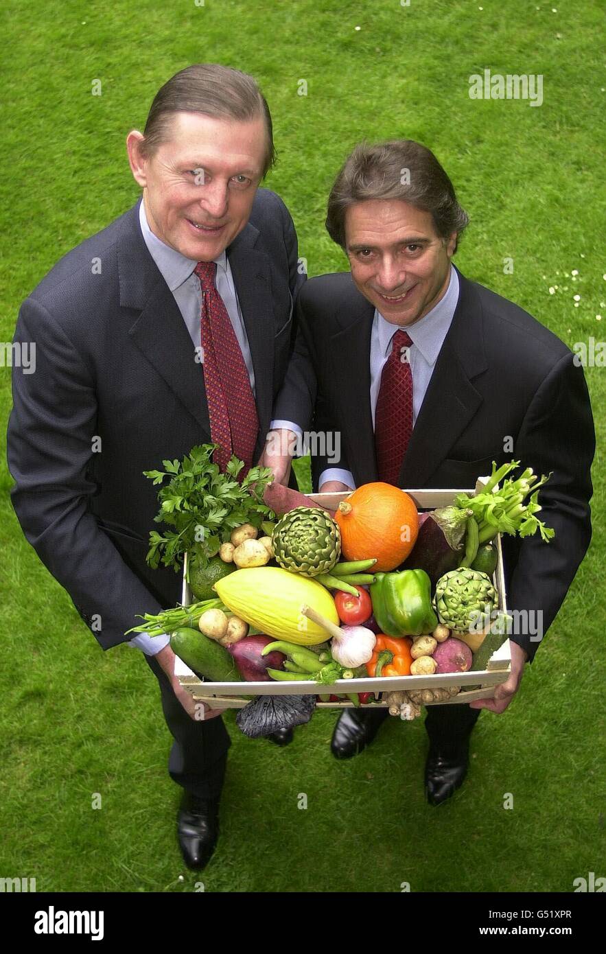 Chairman of Iceland Malcolm Walker, (right) and Director General of the  National Trust, Martin Drury, with organic fruit and vegetables at a photo  call in London, announcing Iceland's eight million pound investment