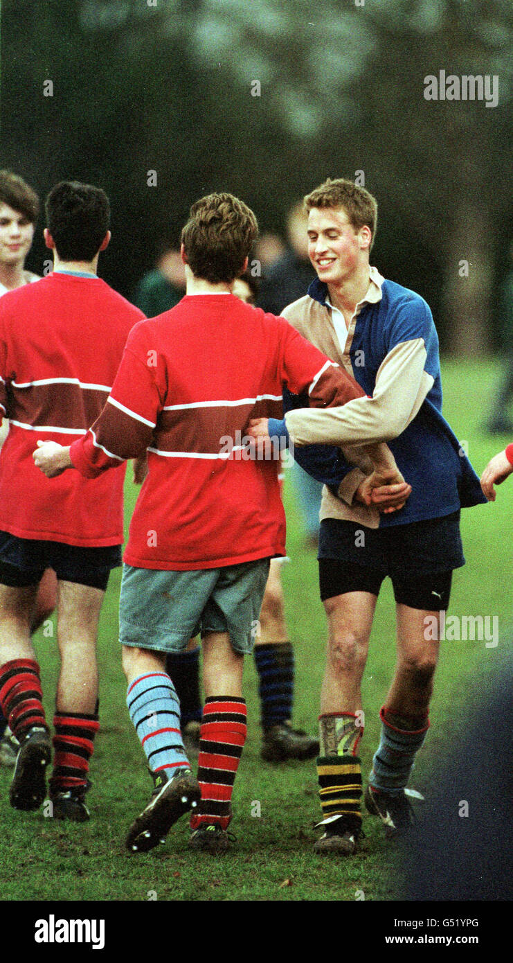 Prince William is seen captaining his side (Gailey's) in his house colours of fawn and blue in the semi-final of an inter-house tournament between Gailey's and Hurst's. Gailey's lost the game 2-1. * Eton plays soccer and its own related game - the 'Field Game' - a mix between rugby and soccer which uses small hockey-sized goals. Prince William played for the 3rd Field winning his colours. He also played rugby for his school throughout his junior years and played for the School 2nd XV until a hand injury stopped him playing. Photograph: Ian Jones. Copyright: St James's Palace. Stock Photo