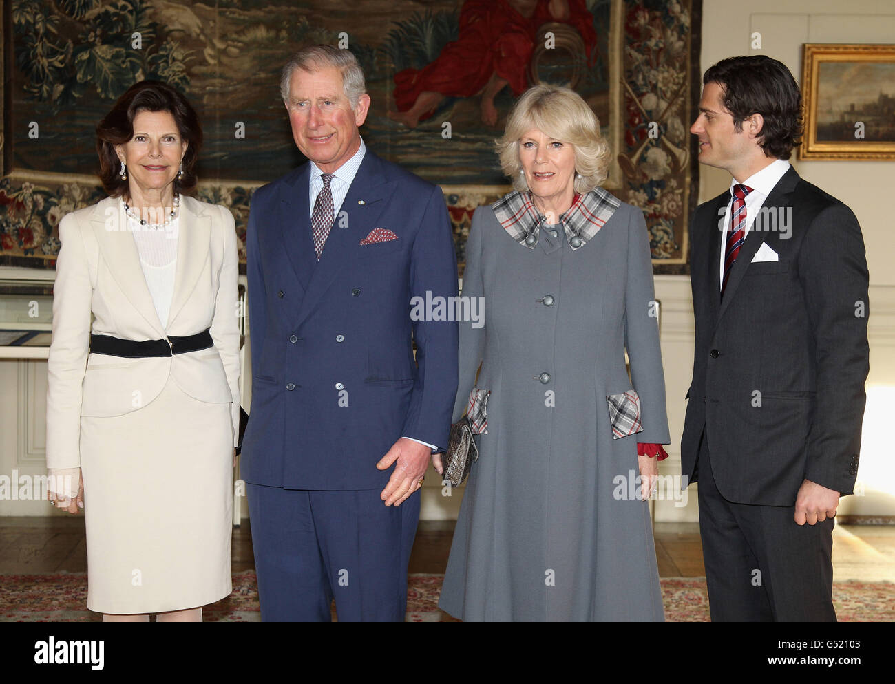 (left - right) Queen Silvia of Sweden, The Prince of Wales, The Duchess of Cornwall and Prince Carl Philip of Sweden pose for an official photo in the Royal Palace in Stockholm, Sweden. Stock Photo