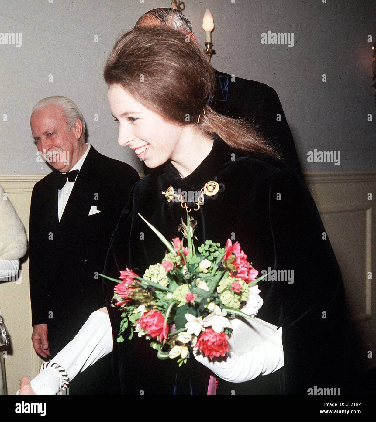 PRINCESS AT EIGHTEEN (b.15/08/1950): Princess Anne, later the Princess Royal, with (background) Sir Arthur Bliss, Master of the Queen's Musick (sic), at the Henry Wood centenary concert at the Royal Albert Hall, London. Stock Photo