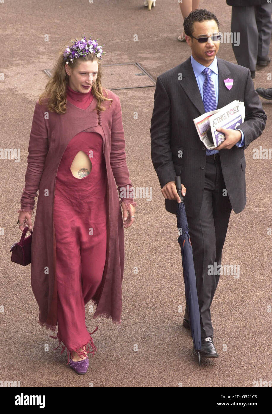 Melissa Hartman, wearing a dress which reveals a tattoo around her