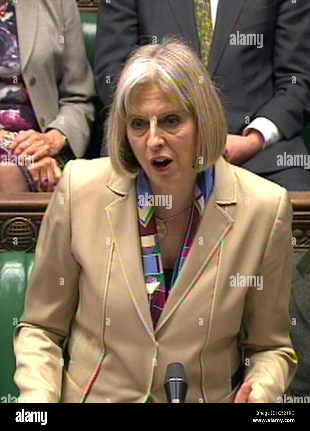 Home Secretary Theresa May speaks in the House of Commons, London, where she announced plans to introduce minimum alcohol pricing. Stock Photo