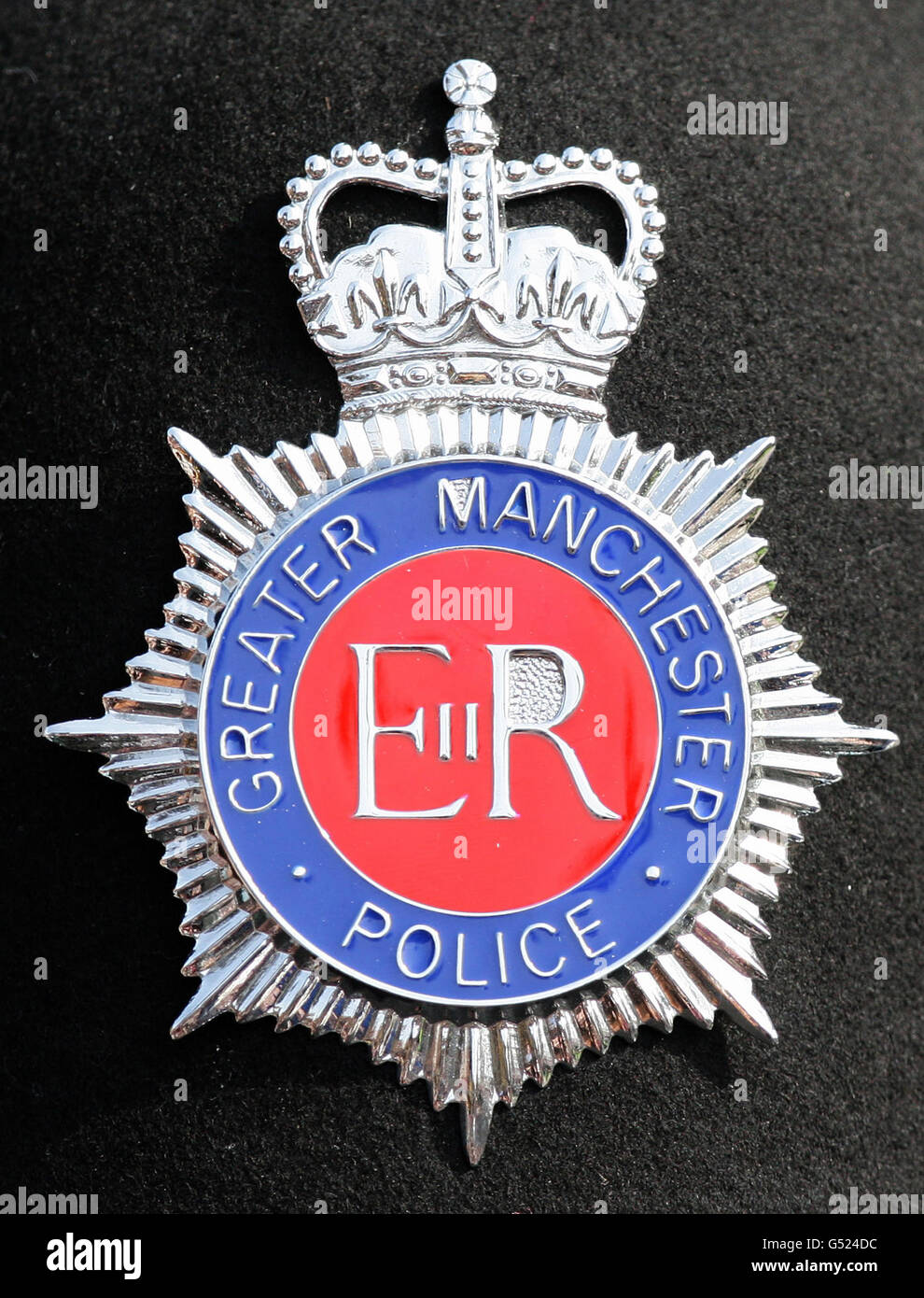 Stock Image Of A Greater Manchester Police Badge On An Officers Helmet stock-image-of-a-greater-manchester-police-badge-on-an-officers-helmet