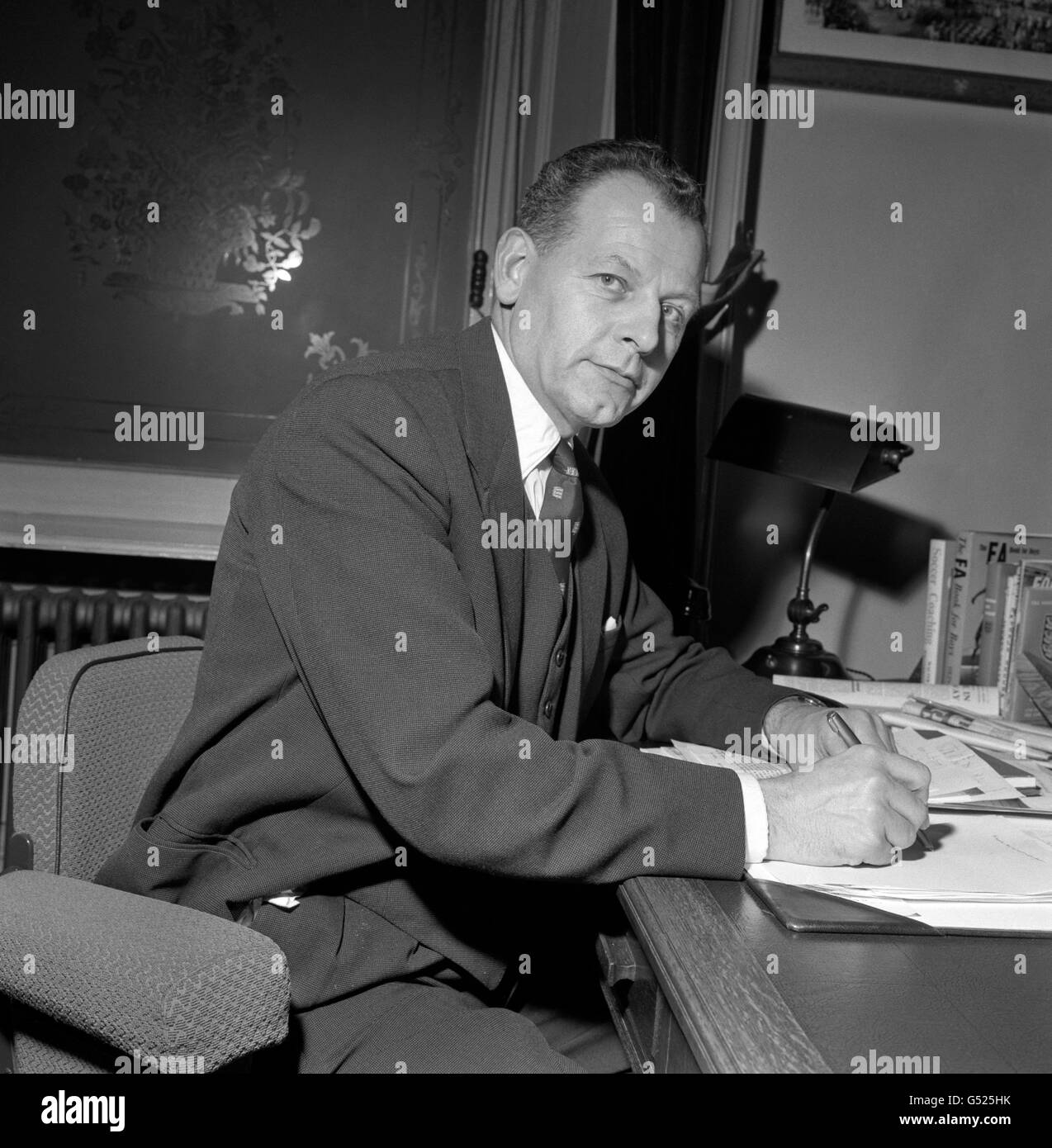 England Manager Walter Winterbottom pictured at his desk. Stock Photo